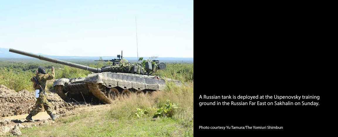 A Russian tank is deployed at the Uspenovsky training  ground in the Russian Far East on Sakhalin on Sunday