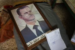 Shattered image of Bashar al-Assad