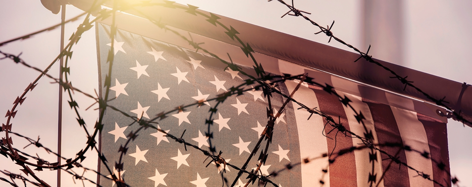 American flag and barbed wire, USA border