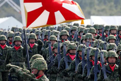 Members of Japan's Self-Defense Forces' infantry unit march during the annual SDF ceremony at Asaka Base, Japan, October 23, 2016
