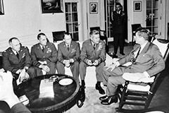5 men in a room meet during Cuban Missile Crisis