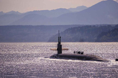 Figure 1. An SSBN returns home from patrol.  The ballistic missile submarine USS Louisiana travels in Hood Canal, Washington, May 3, 2018 as it returns to Naval Base Kitsap-Bangor following a strategic deterrent patrol. Navy photo by Lt. Cmdr. Michael Smith. Image courtesy of US Defense Department