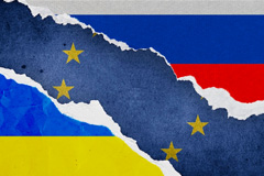 Russia and Ukraine flag with EU flag ripped in-between