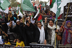 Pakistani protesters shout anti-Indian slogans in Karachi on Feb. 23, a day after Indian authorities arrested dozens of Muslim leaders in raids across Kashmir and sent thousands of reinforcements to the troubled territory. (Rizwan Tabassum/AFP/Getty Images)