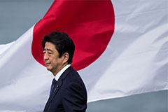Shinzō Abe in front of Japanese flag