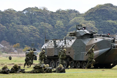The Ground Self-Defense Force's new Amphibious Rapid Deployment Brigade carries out a demonstration exercise April 7 in Sasebo, Nagasaki Prefecture. | KYODO