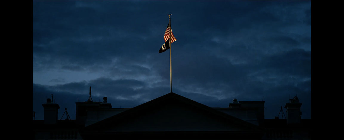 The US flag against a stormy skycape