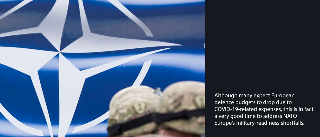European Troops in front of NATO banner with quote from Barry Posen