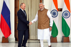Indian Prime Minister Narendra Modi with Russian President Vladimir Putin before their meeting, at Hyderabad House, on October 5, 2018 in New Delhi, India. SONU MEHTA/HINDUSTAN TIMES VIA GETTY IMAGES