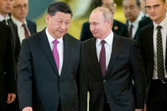 Chinese President Xi Jinping, left, and Russian President Vladimir Putin meet in the Kremlin in Moscow in 2019. (Alexander Zemlianichenko/Pool/AP)