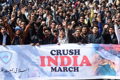  Pakistani students take part in an anti-India protest rally in Lahore last week. Photograph: Arif Ali/AFP/Getty Images 