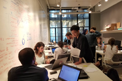 Israeli and Palestinian fellows from Our Generation Speaks work with MIT student interns at MITdesignX, a venture accelerator in the School of Architecture and Planning, to develop startups that tackle urban and design issues.  Photo: Gilad Rosenzweig