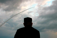 North Korean leader Kim Jong Un watches the launch of a ballistic missile at an unknown location in the nuclear-armed country on July 31, 2019. | KCTV / VIA AFP-JIJI