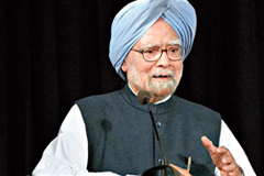 Manmohan Singh speaking at a podium