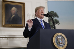 President Donald Trump delivers a statement on the Iran nuclear deal from the Diplomatic Reception Room of the White House