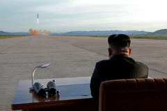 North Korean leader Kim Jong Un watches the launch of a Hwasong-12 missile in this undated photo released by North Korea's Korean Central News Agency (KCNA) on September 16, 2017. KCNA via REUTERS 