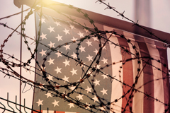 American flag and barbed wire, USA border