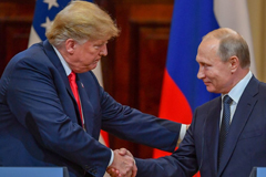 President Trump and Russia's President Vladimir Putin shake hands before attending a joint press conference after a meeting at the Presidential Palace in Helsinki, on July 16, 2018. (Yuri Kadobnov/AFP/Getty Images)