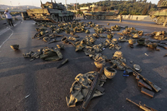 Clothes and weapons belonging to soldiers involved in the coup attempt that have now surrendered lie on the ground abandoned on Bosphorus Bridge on July 16, 2016, Istanbul, Turkey. (Gokhan Tan/Getty Images)