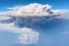 a vast "pyrocumulus" cloud generated by the Creek Fire in the Sierra Nevada Mountains.
