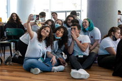 Group of MEET participants taking a selfie together
