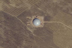 satellite image of a silo field