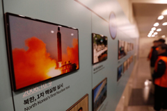 A photo showing North Korea's missile launch is displayed at the Unification Observation Post in Paju, South Korea, near the border with North Korea, Dec. 13, 2019.