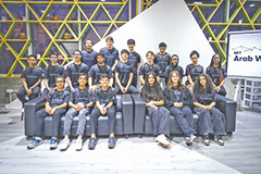 A group of students at a robotics workshop
