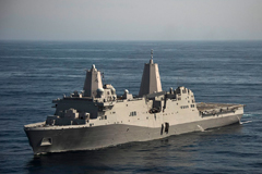 The U.S. Navy amphibious transport dock ship USS San Diego (LPD-22) underway conducting an underway recovery test for NASA's Orion crew module.