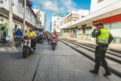 A police officer and commuters