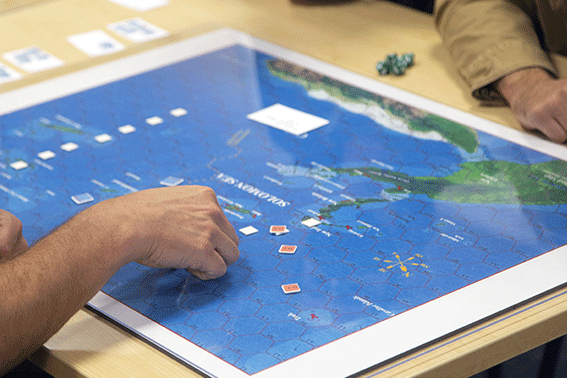 Students playing a wargame