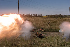 Ukrainian soldiers fire a SPG recoilless gun during a military training.