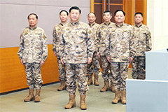 Chinese President Xi Jinping flanked by military officials.