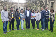 Empowering the Teachers spring 2022 cohort with MIT Professor Tayo Akinwande (center) at Killian Court.