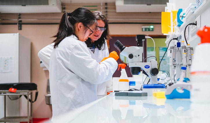 Two women working in a lab