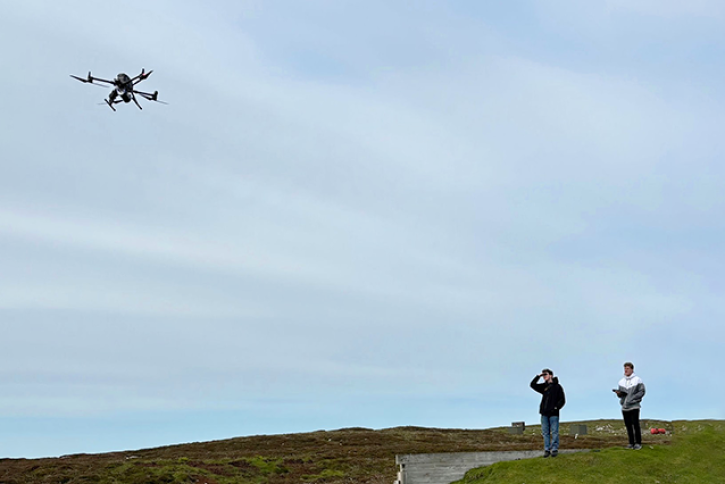 Students working with a drone in Ukraine