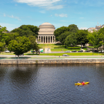 View of the Dome from the Charles river with a Kayak in the foreground